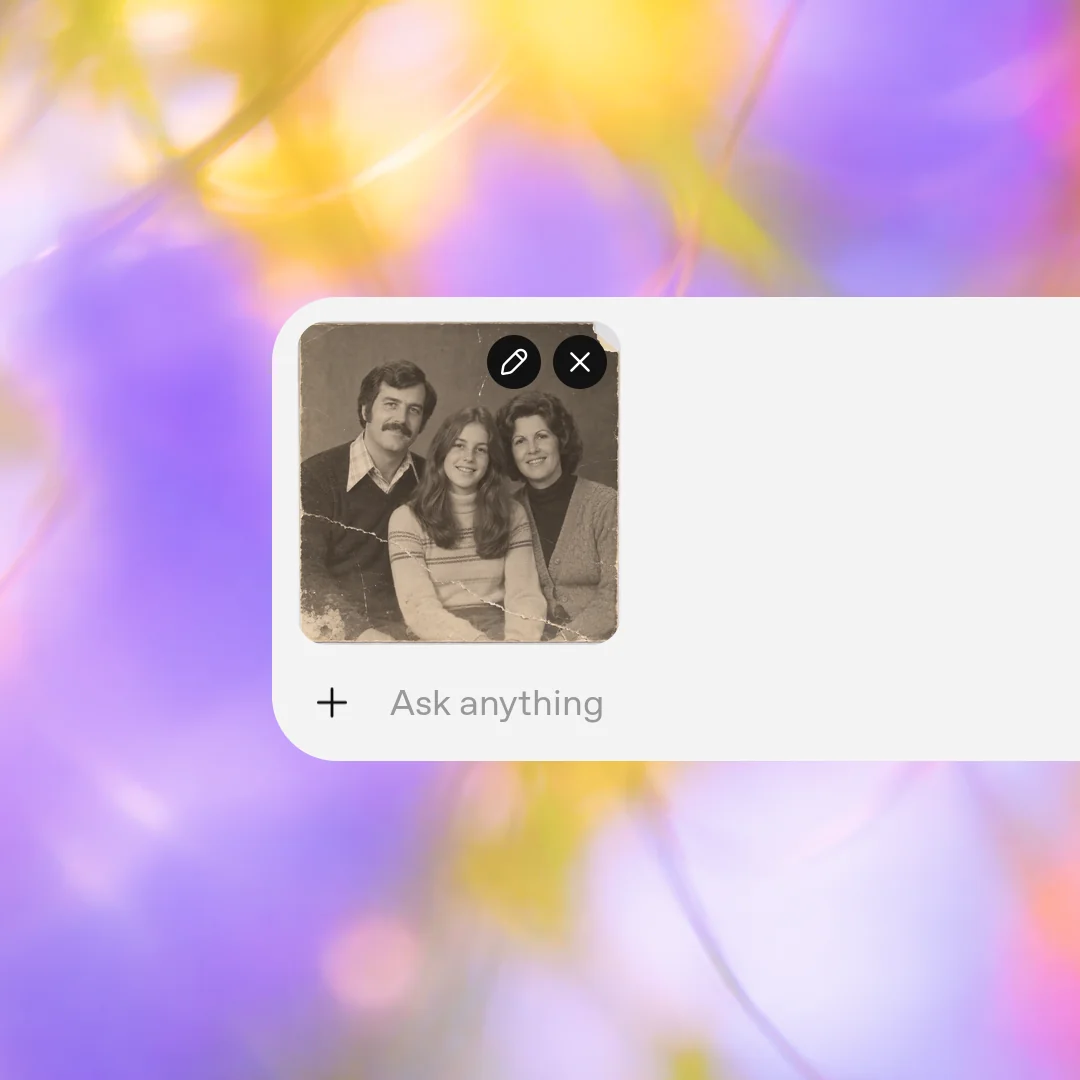 Step 1: Upload your scanned photo. A warm monochrome family portrait with repaired fading, scratches and torn paper.